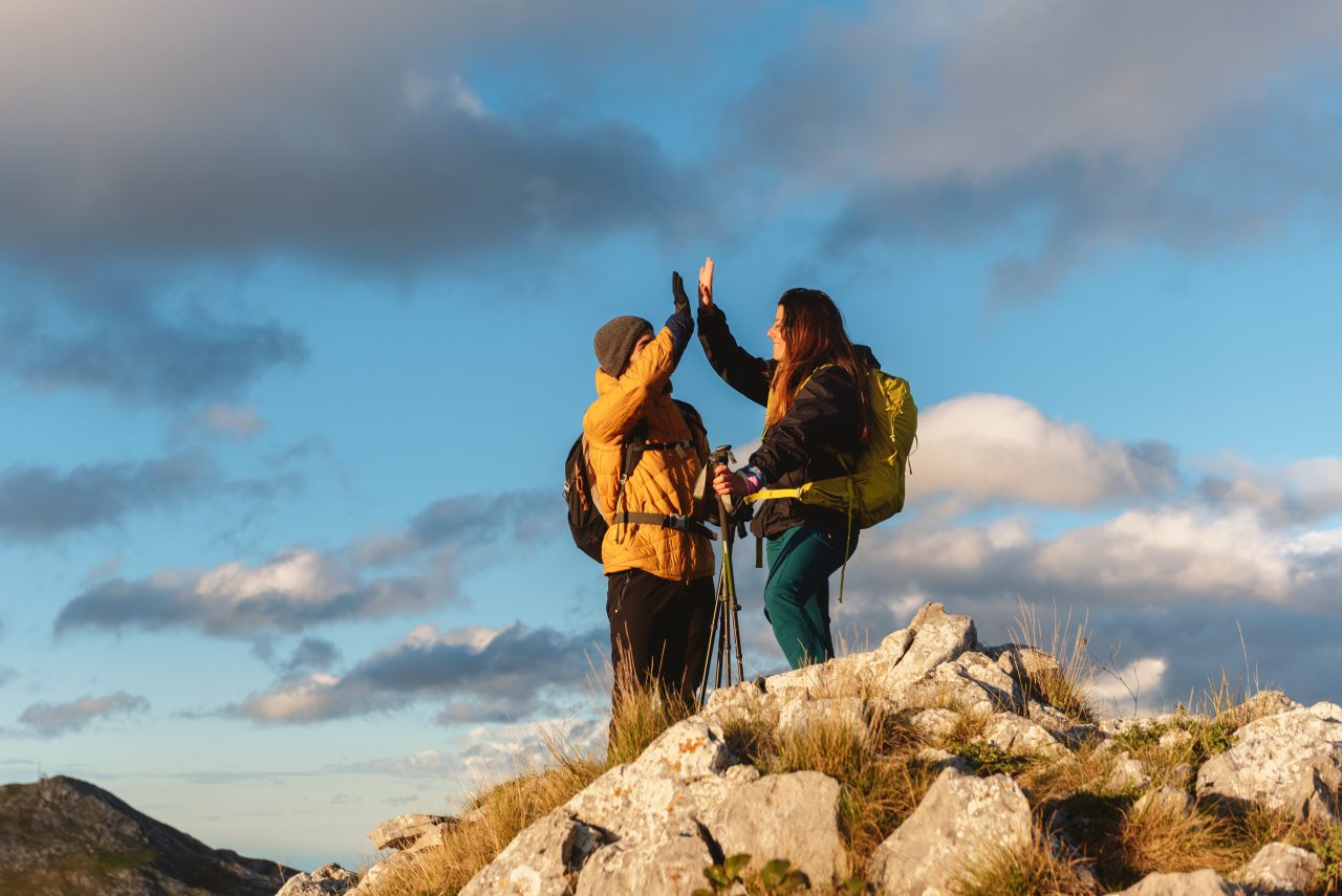 people-hiking-in-the-mountains-e1699012289177.jpg
