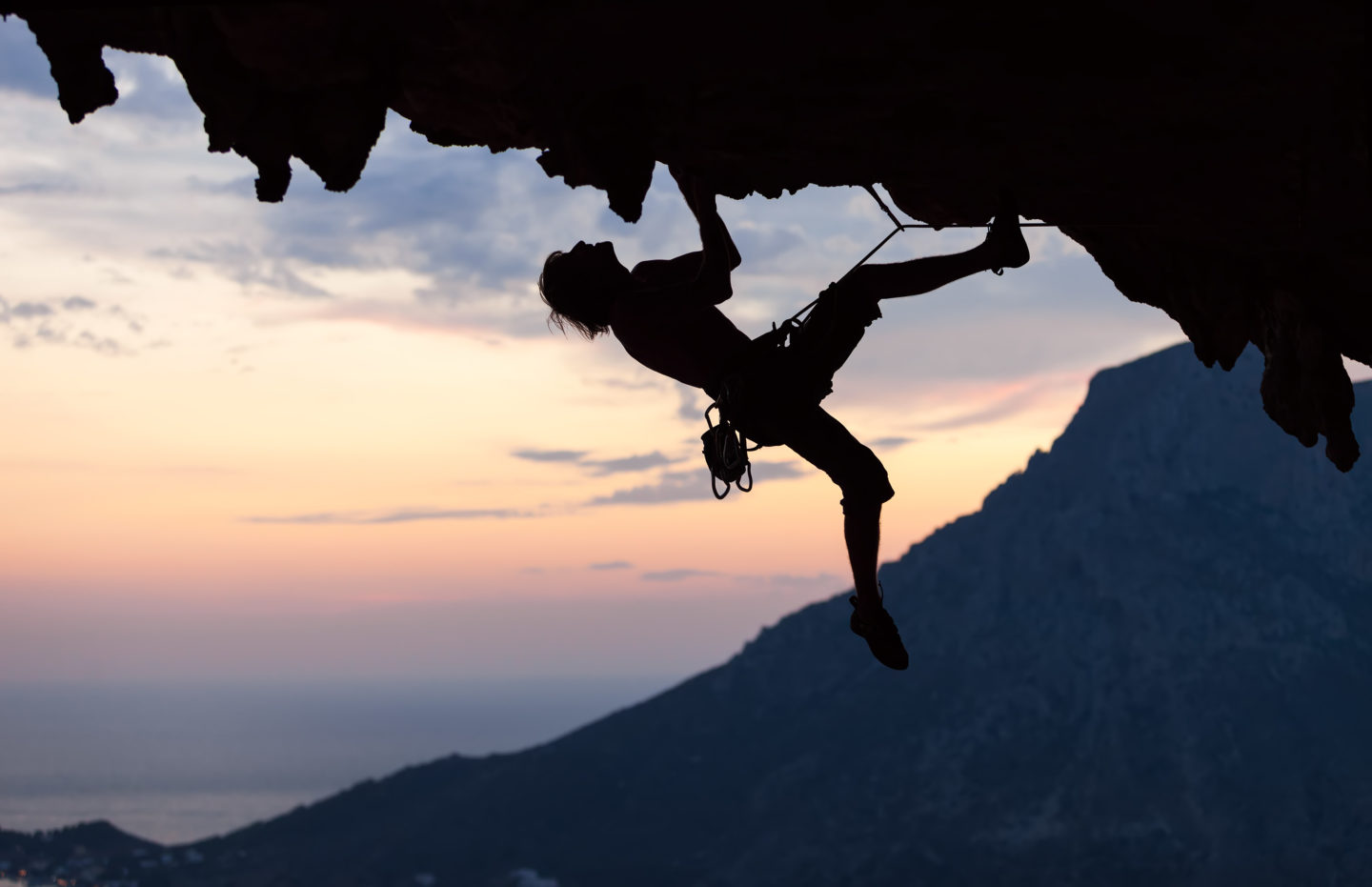 silhouette-of-a-rock-climber-at-sunset-kalymnos-island-greece-e1695354964356.jpg